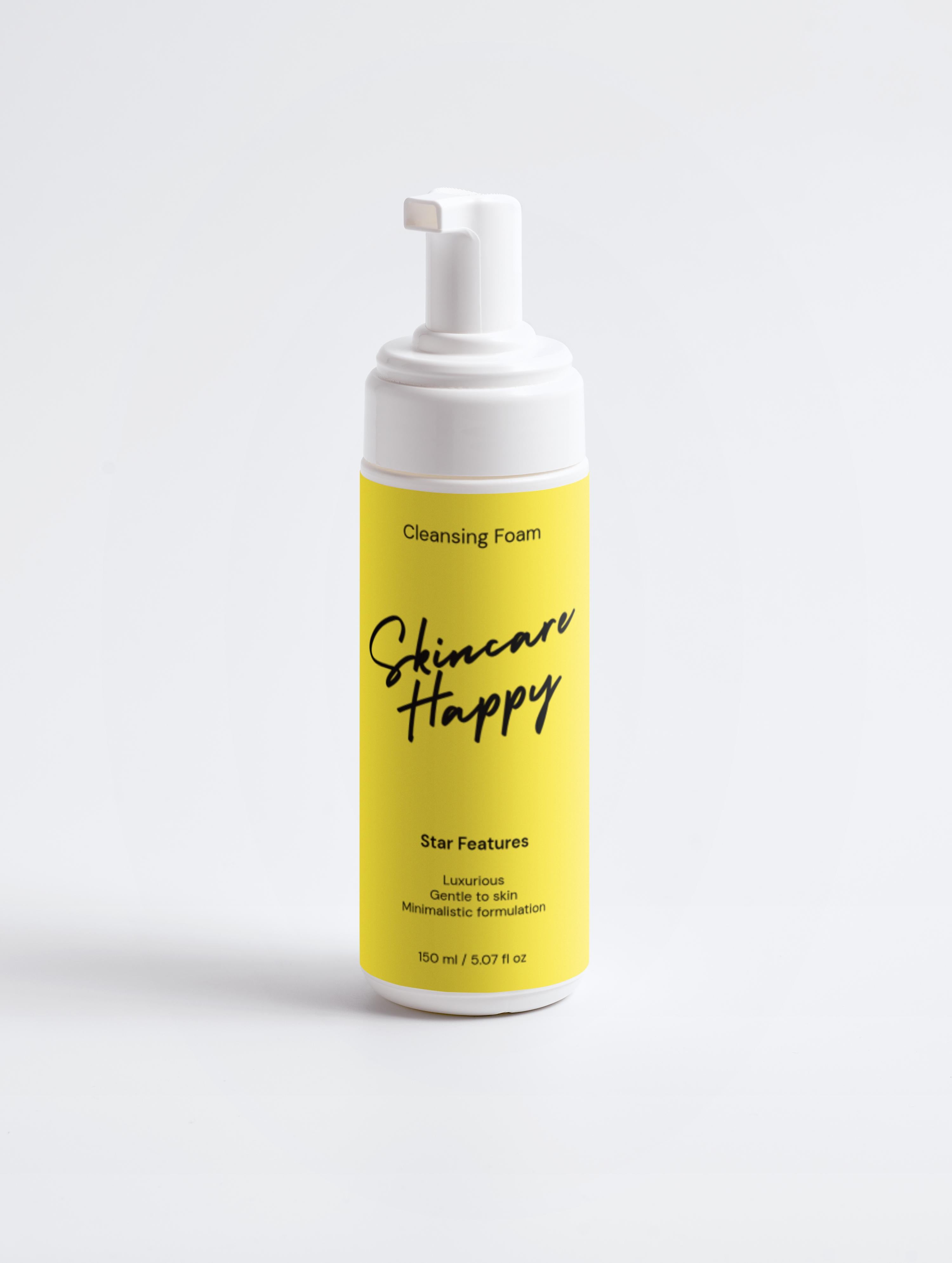 Skincare Happy cleansing foam bottle with yellow label on a white background