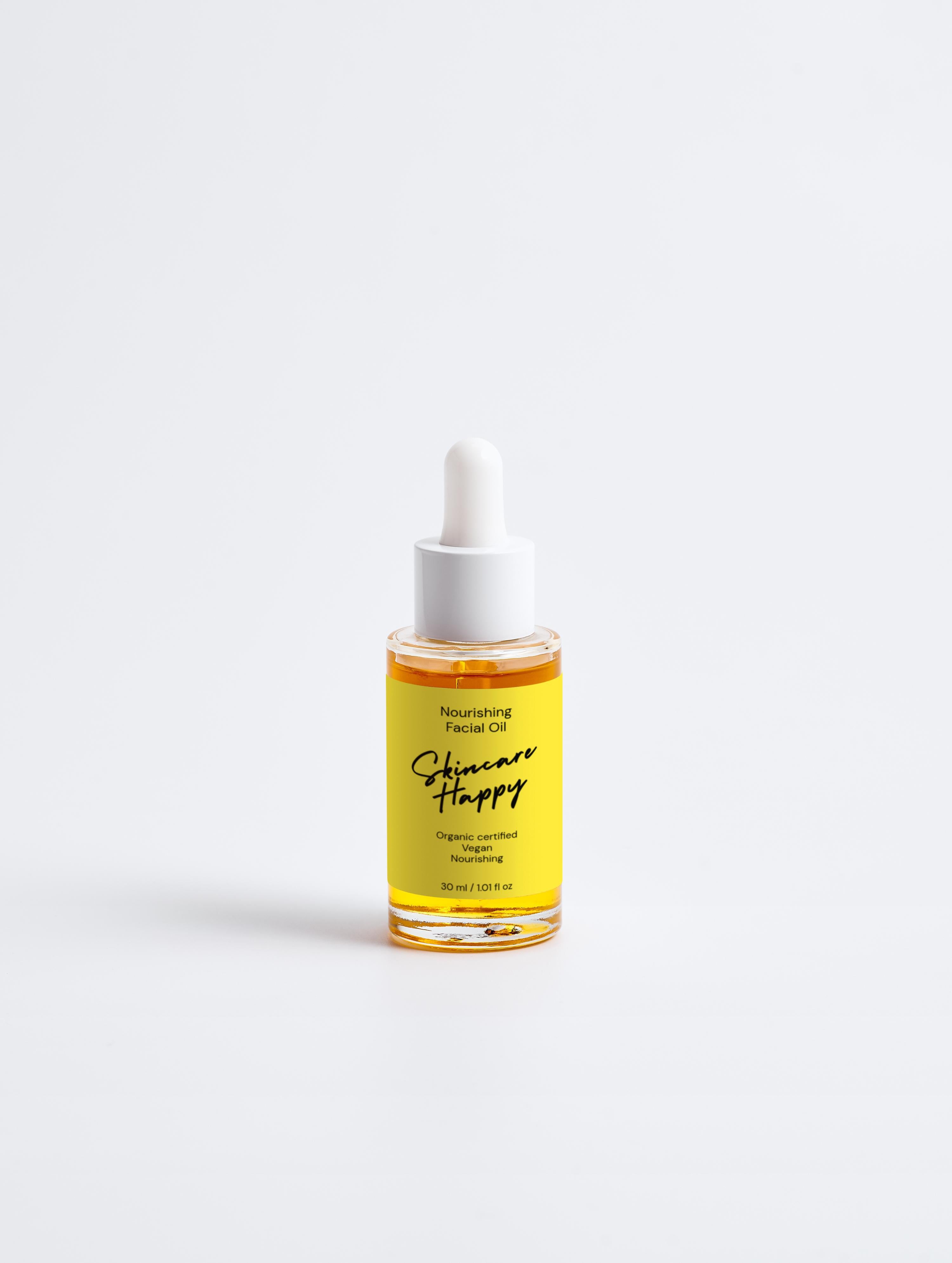 Bottle of skincare serum with dropper on a white background
