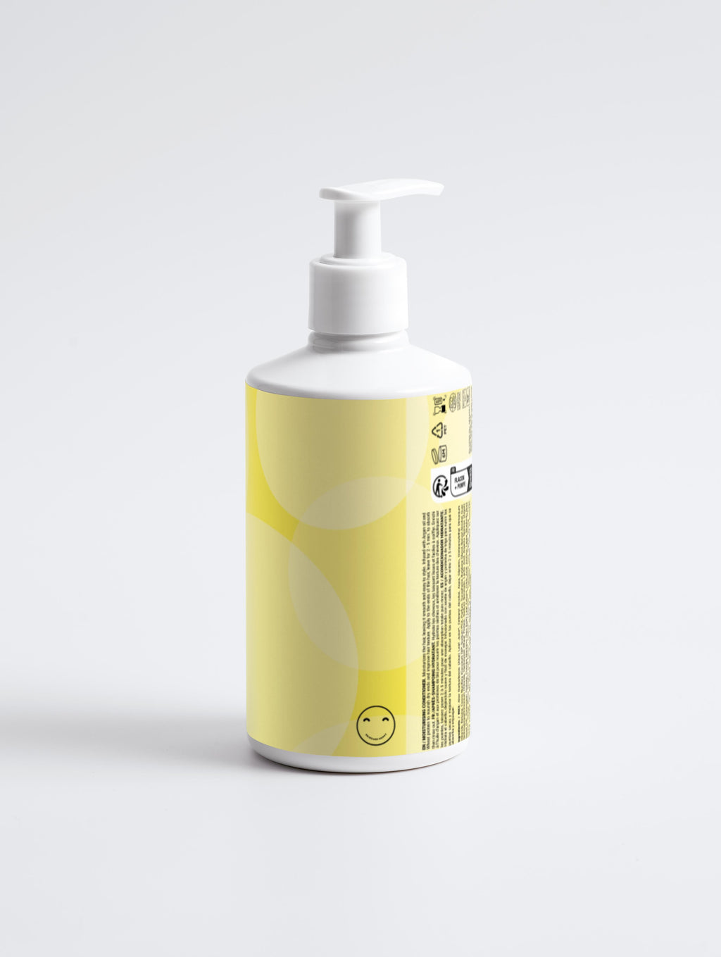 Bottle with a yellow label featuring a smiley face on a white background