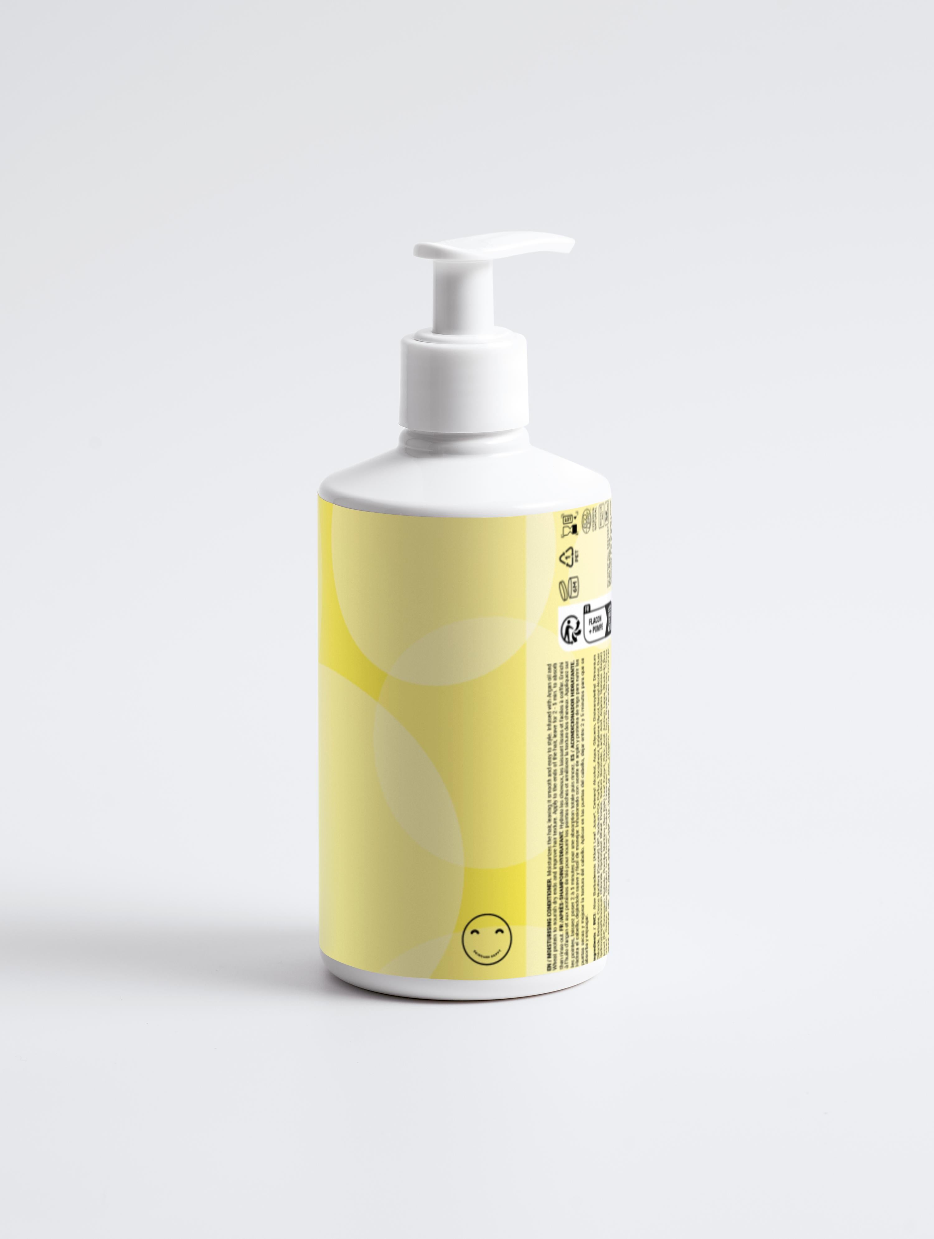 Bottle with a yellow label featuring a smiley face on a white background