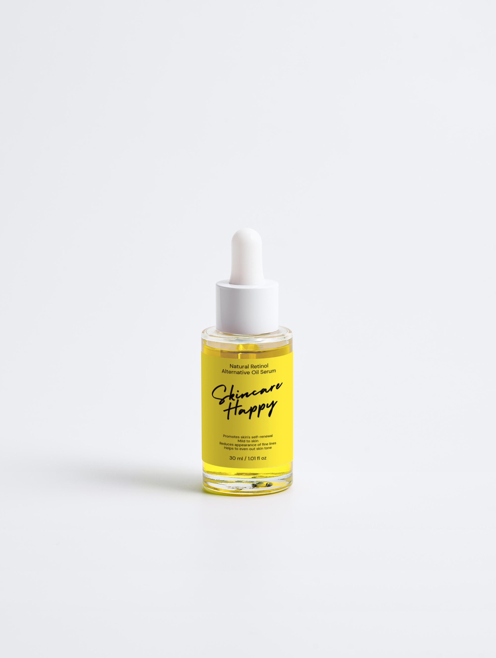 Bottle of skincare serum with yellow label on a white background