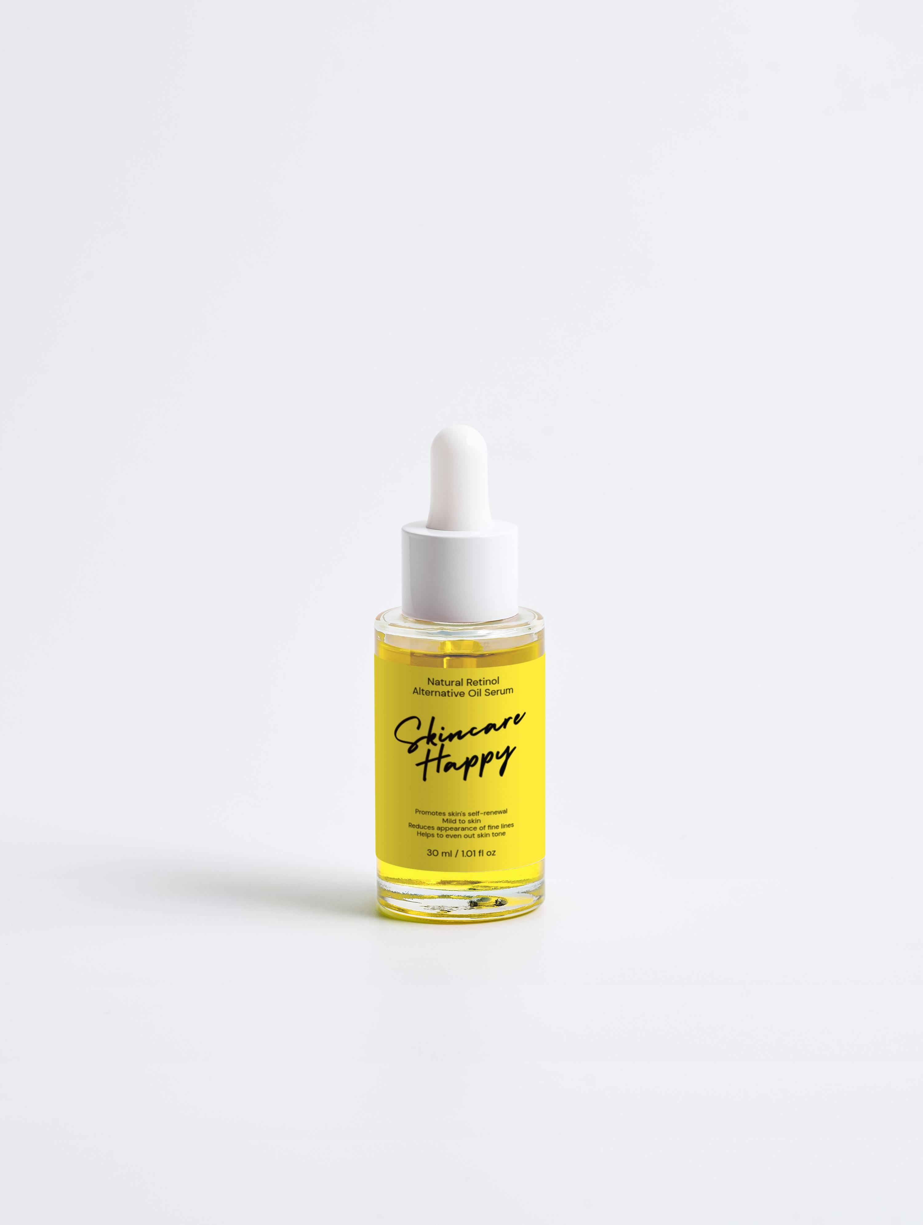 Bottle of skincare serum with yellow label on a white background