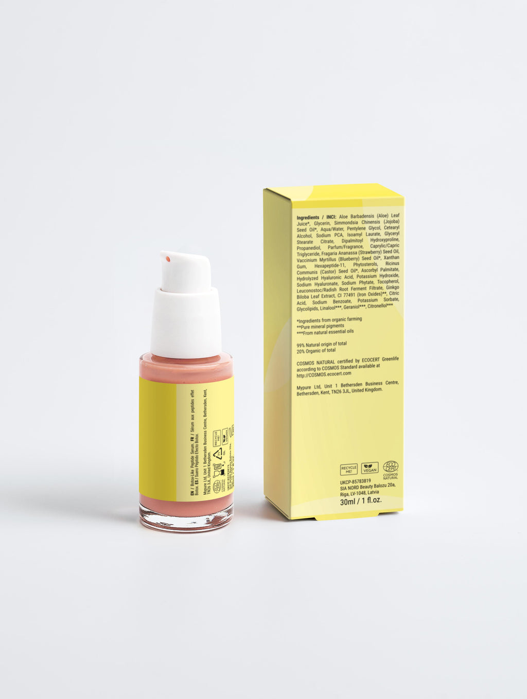 Skincare bottle with pink liquid and white cap next to its packaging on a light gray background