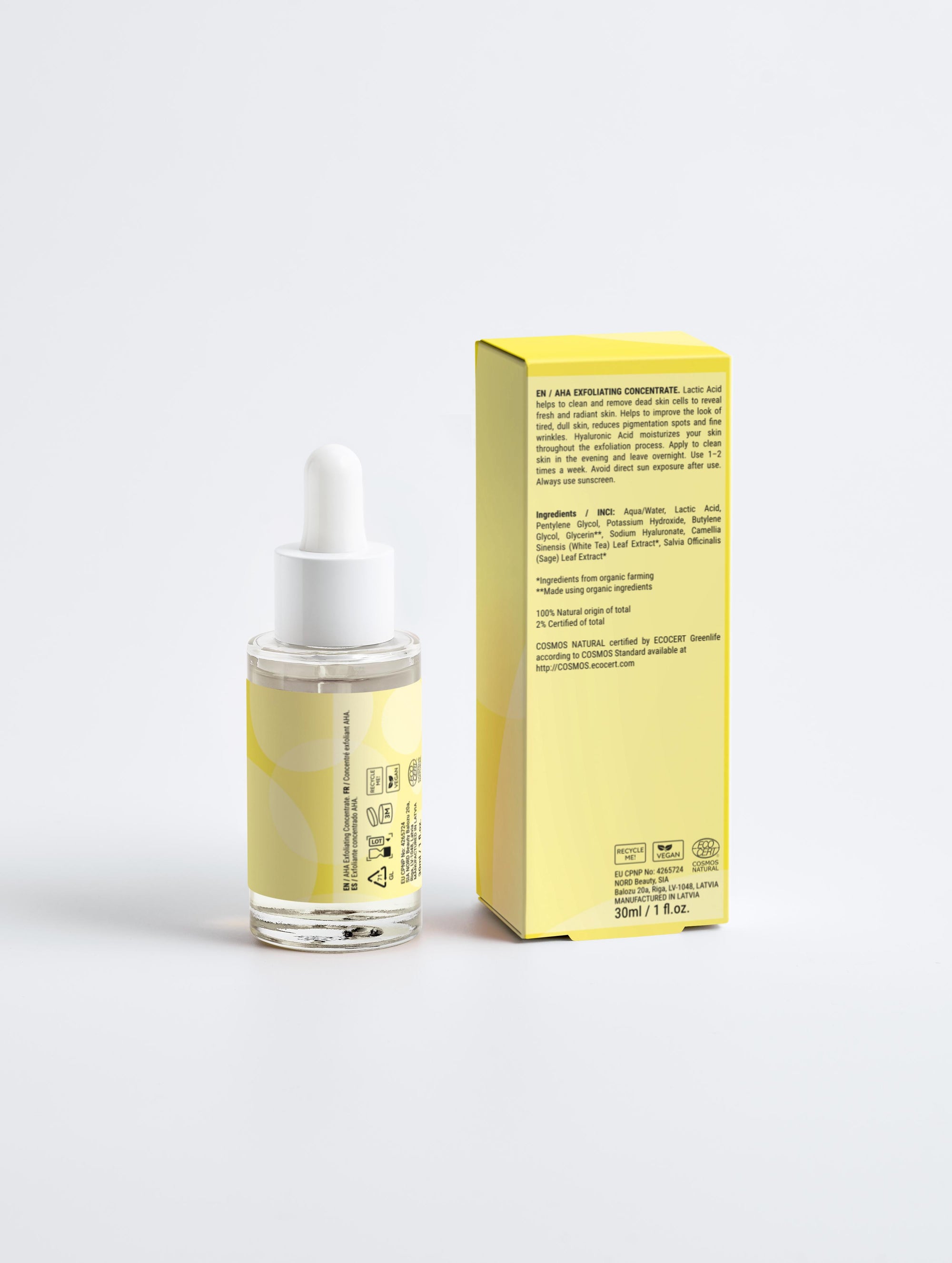 Bottle of clear liquid with dropper and yellow box on a white background