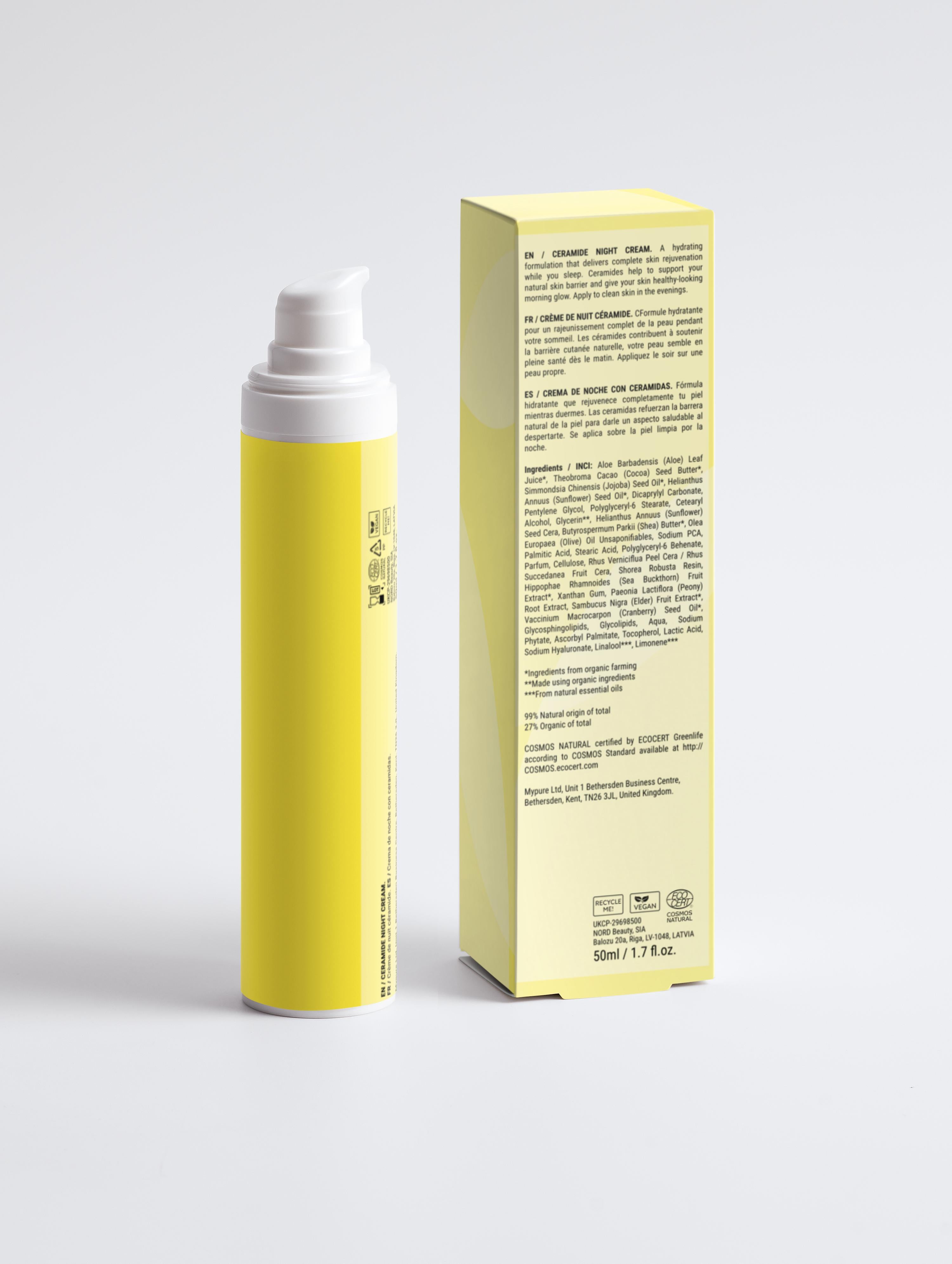 Yellow spray bottle and its packaging on a light gray background
