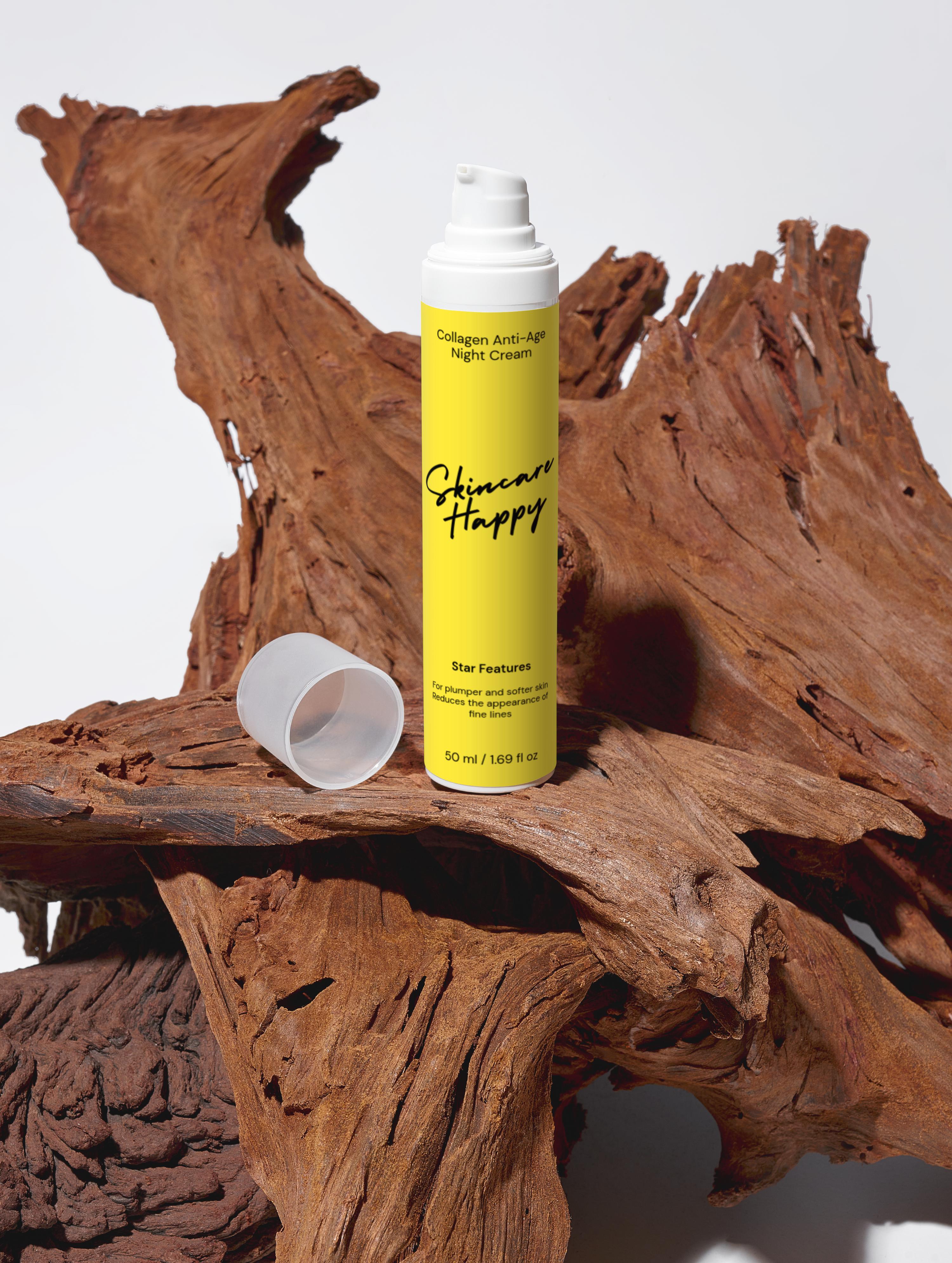 Skincare product bottle with yellow label on a wooden surface