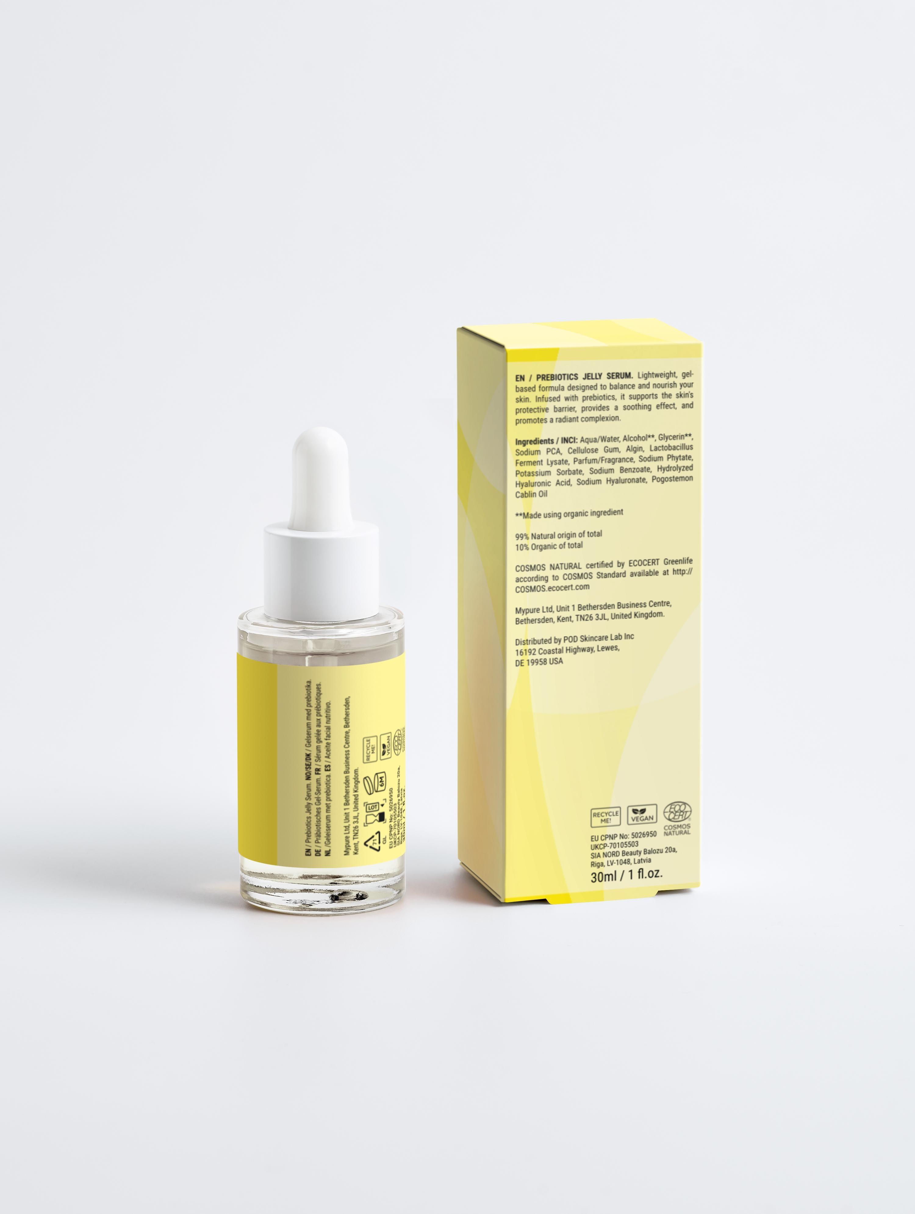 Yellow skincare product bottle and box on a light gray background