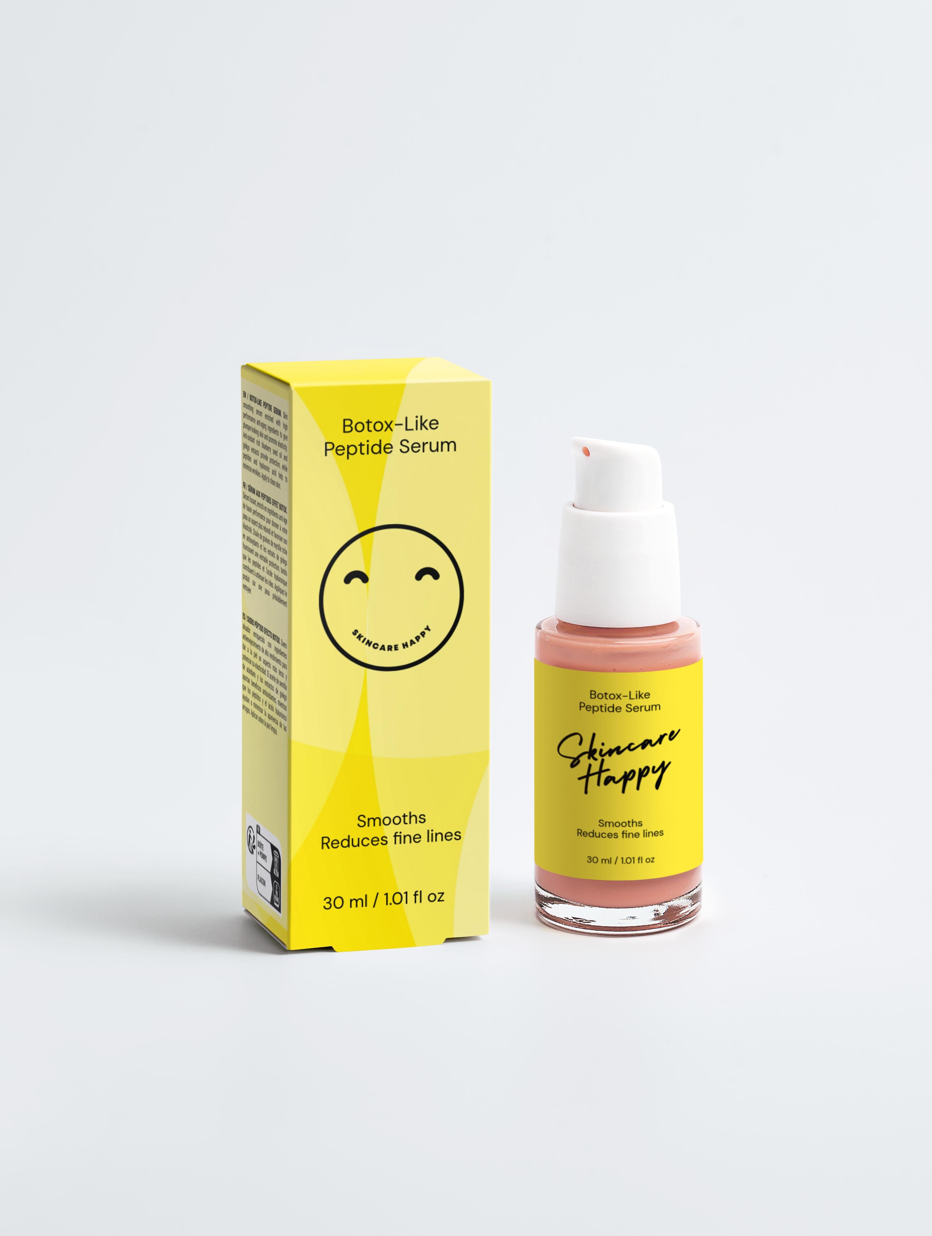 Skincare serum bottle and packaging on a light gray background