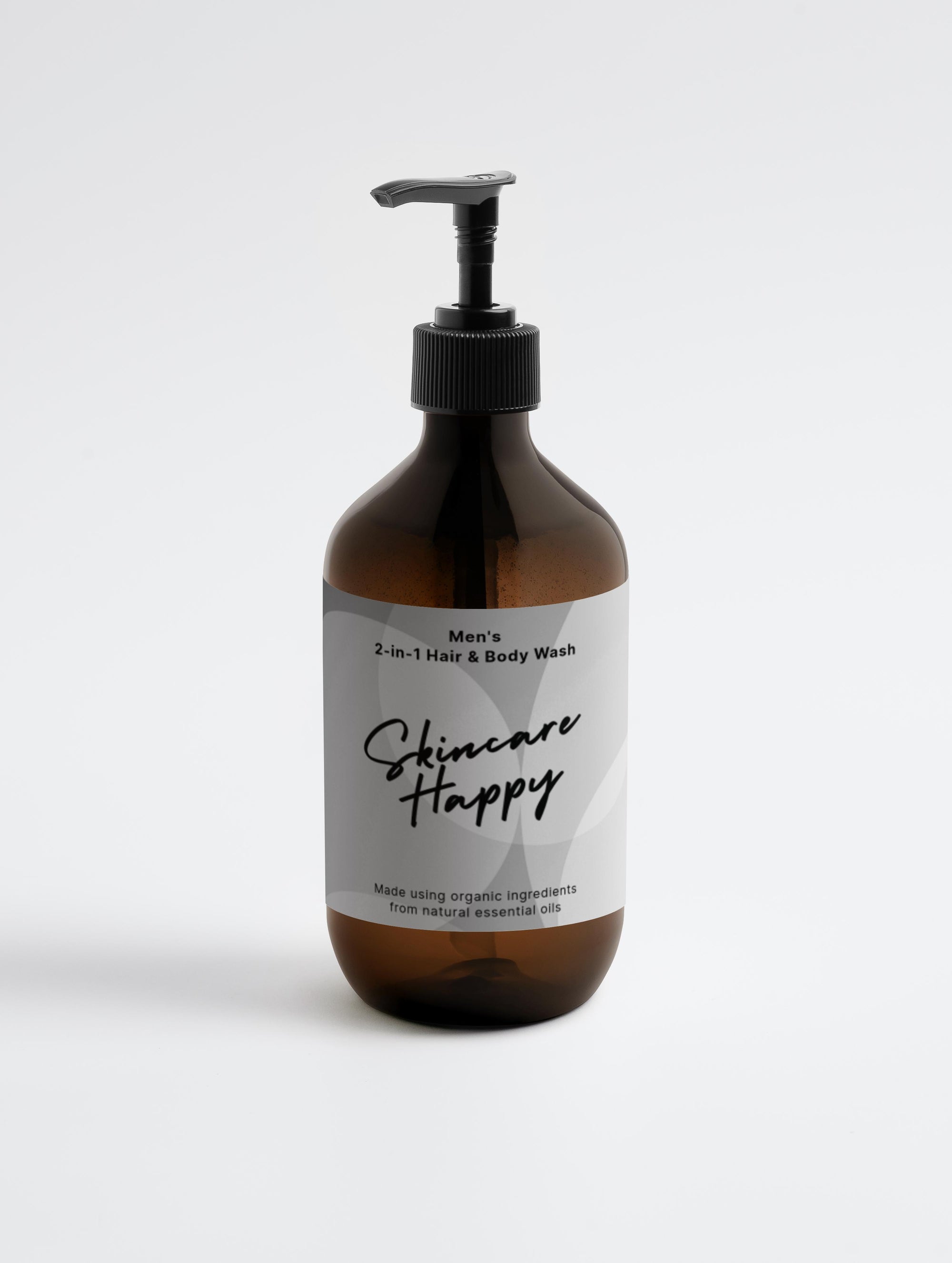 Brown bottle of Men's 2-in-1 Hair & Body Wash with a pump, labeled 'Skincare Happy' on a white background.