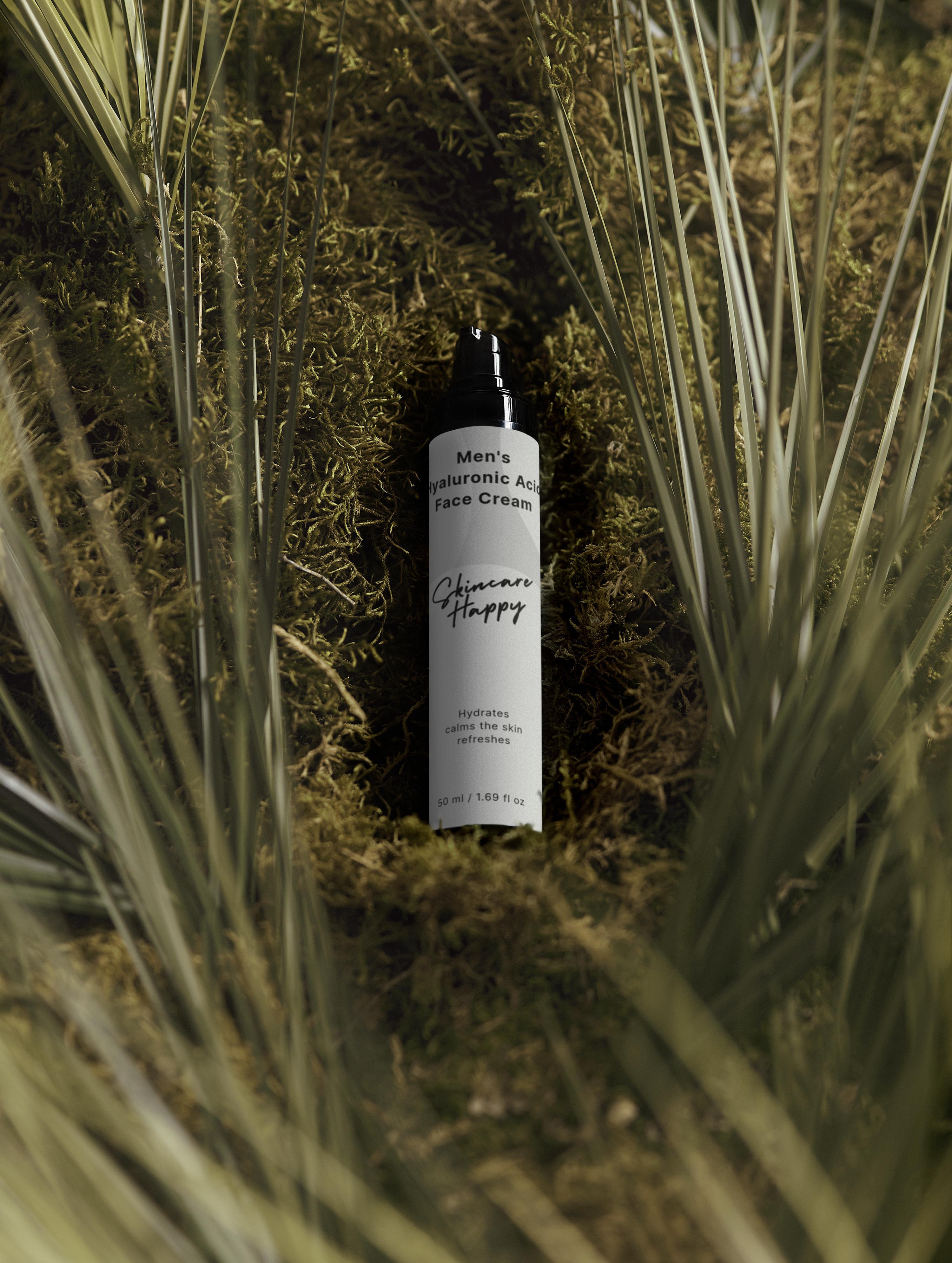 Skincare bottle labeled 'Happy' in a natural setting with plants