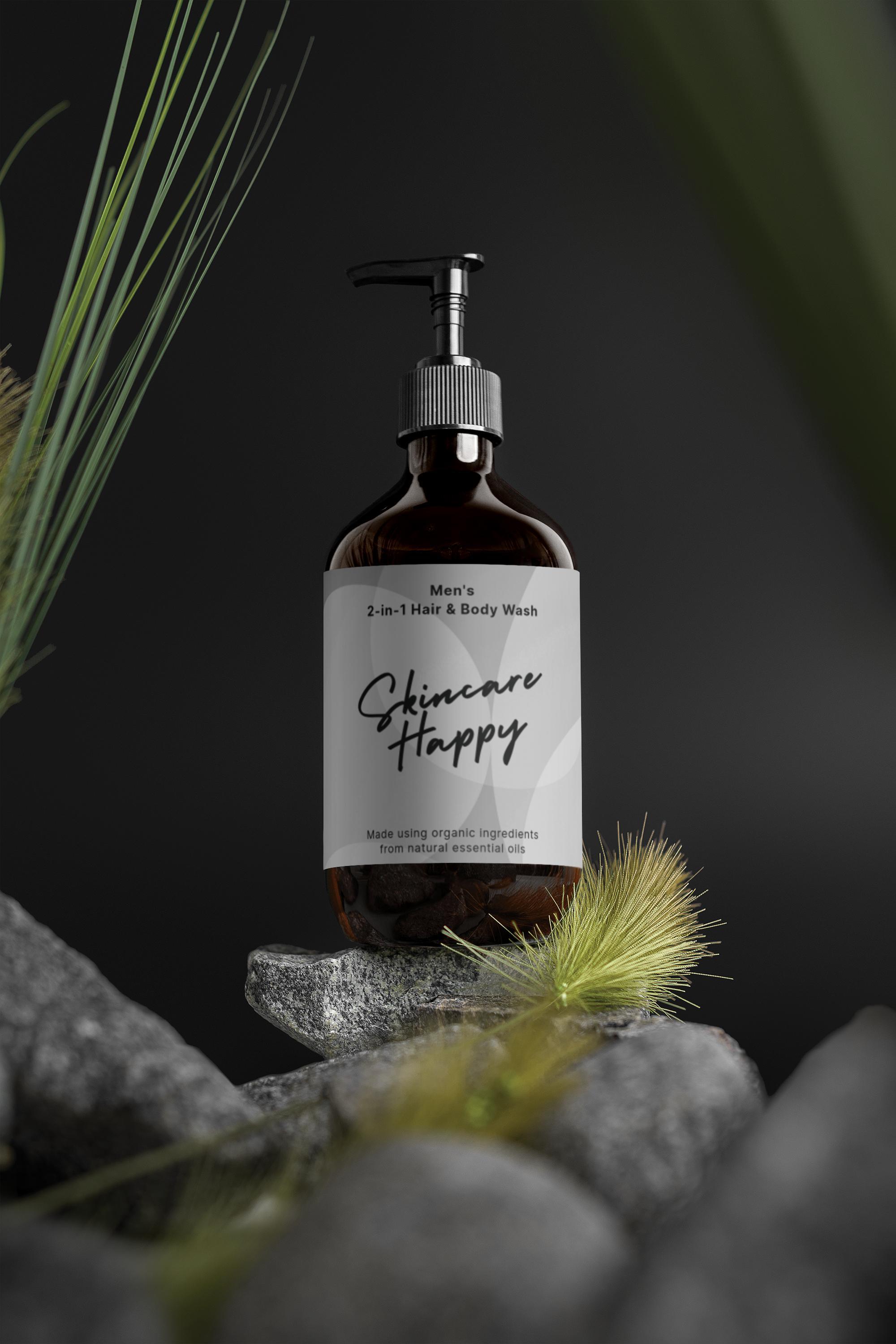 Bottle of 'Skincare Happy' men's 2-in-1 hair & body wash on a dark background with greenery.