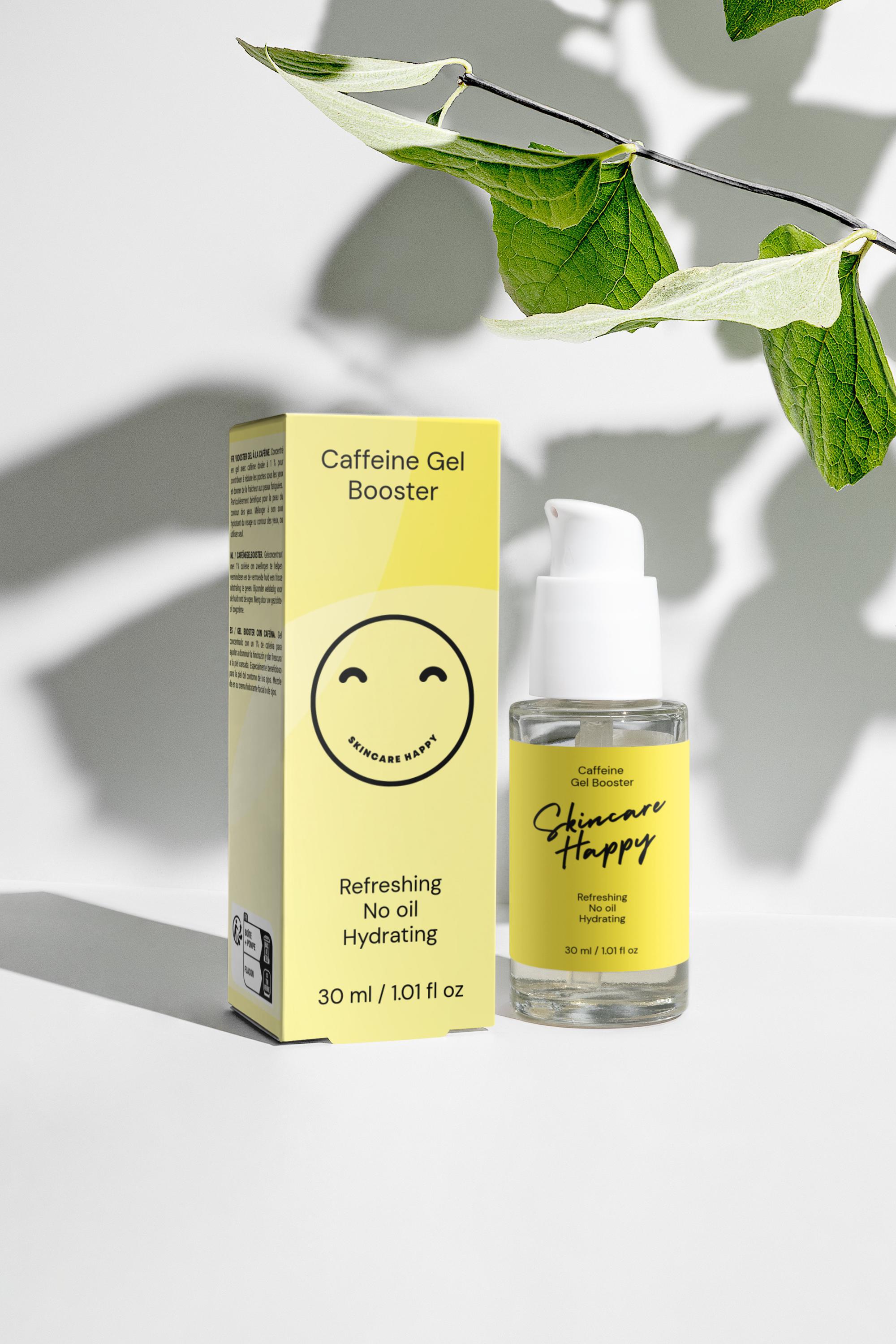 Caffeine gel booster packaging and bottle with a yellow label on a light background
