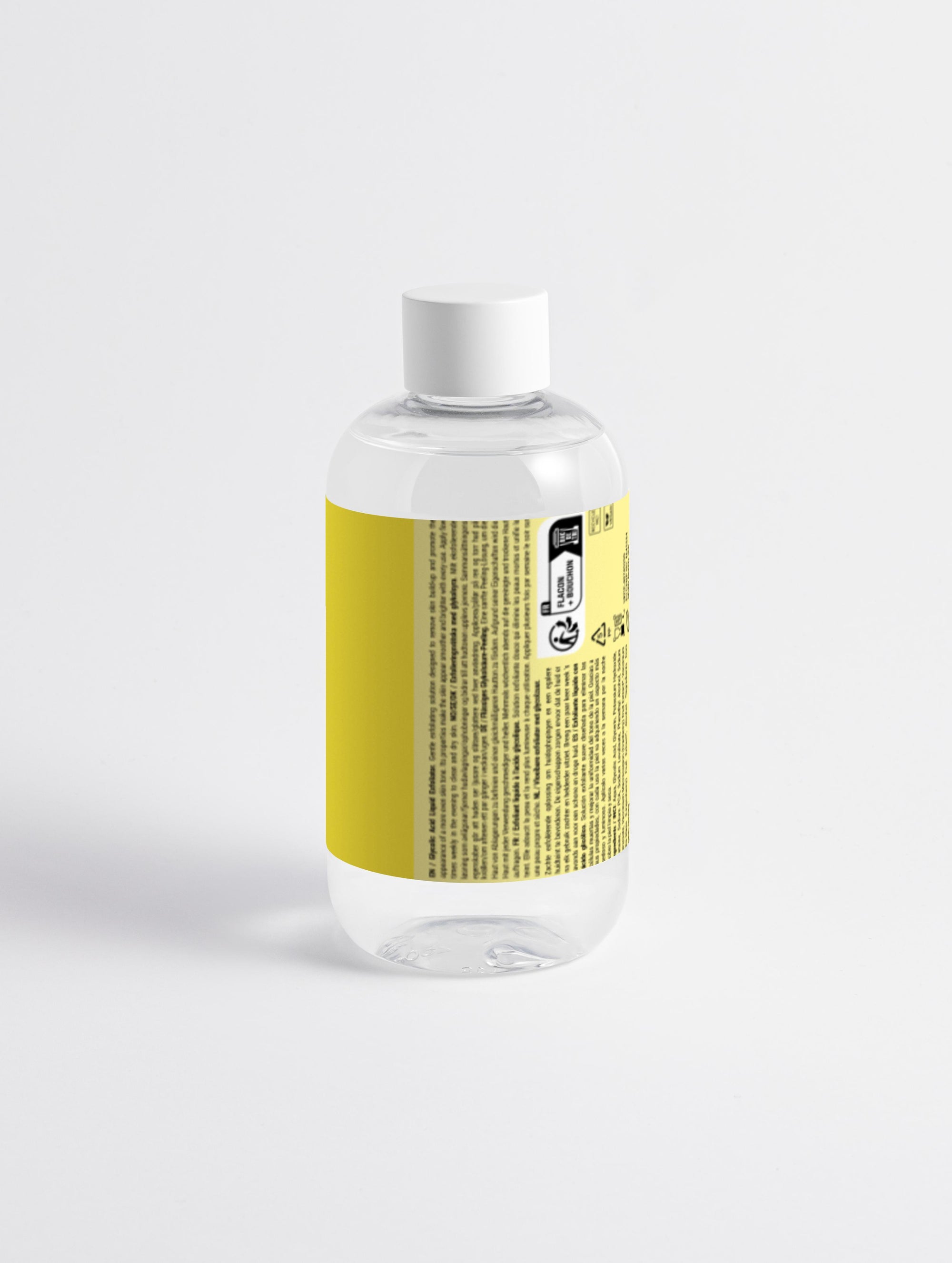 Clear bottle with a yellow label on a white background