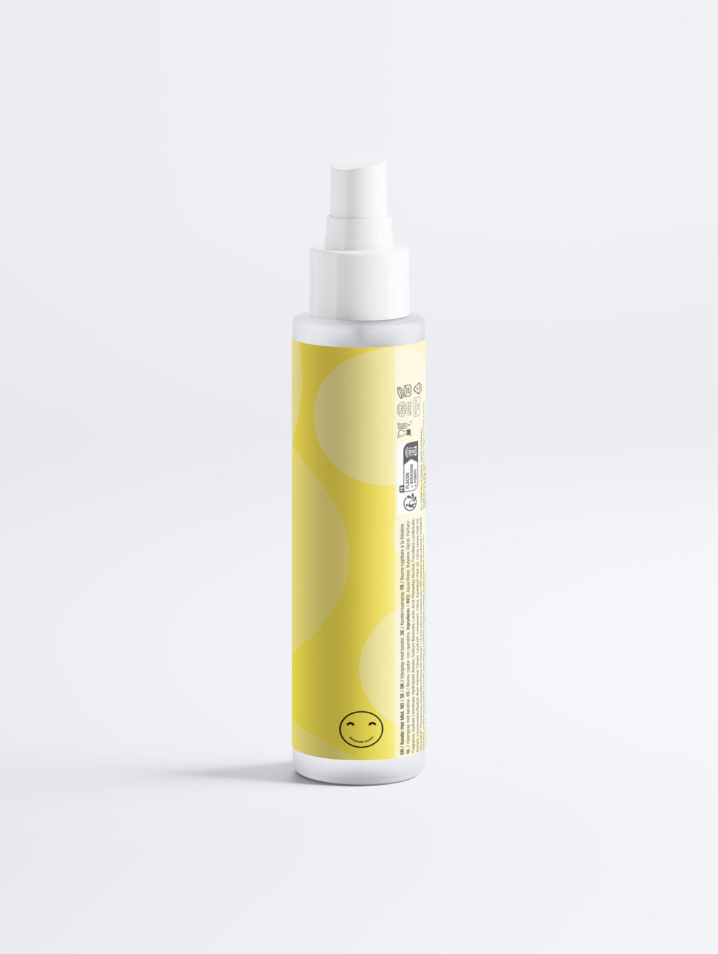 Spray bottle with a yellow label featuring a smiley face on a white background
